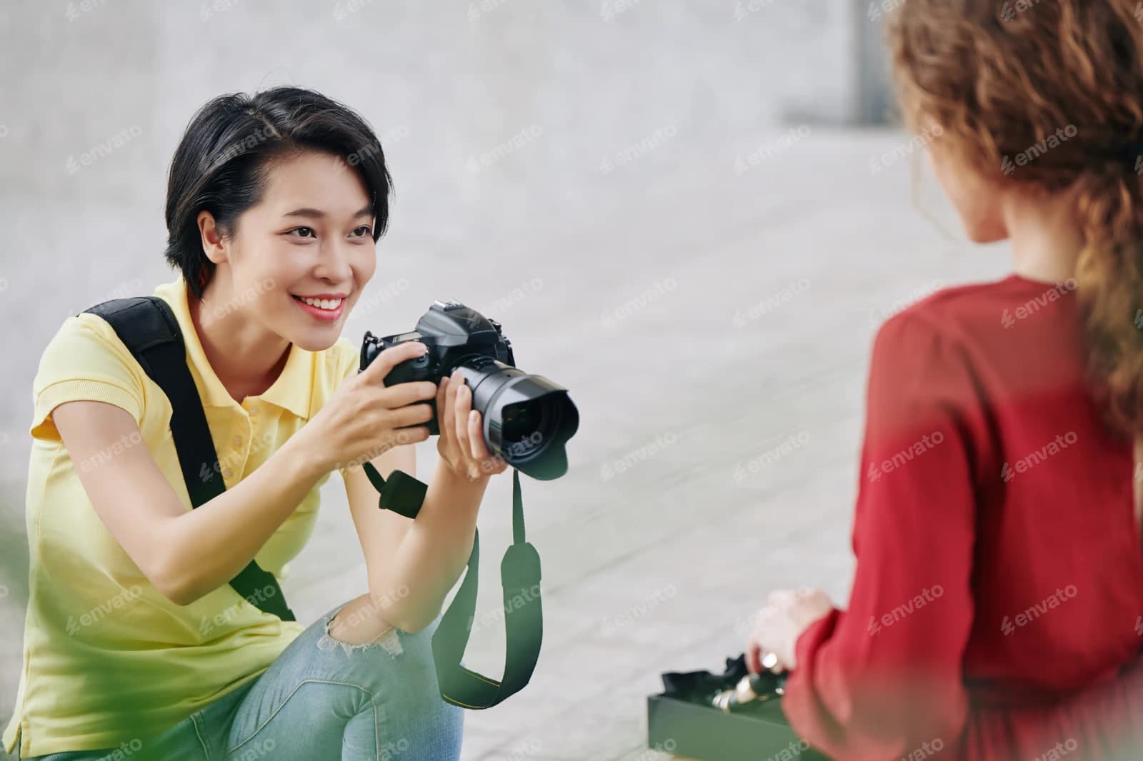 Professional photographer holding a camera in New York city